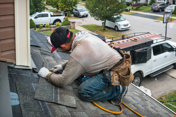 Professional Emergency Roof Repair technician working in Whitinsville, MA